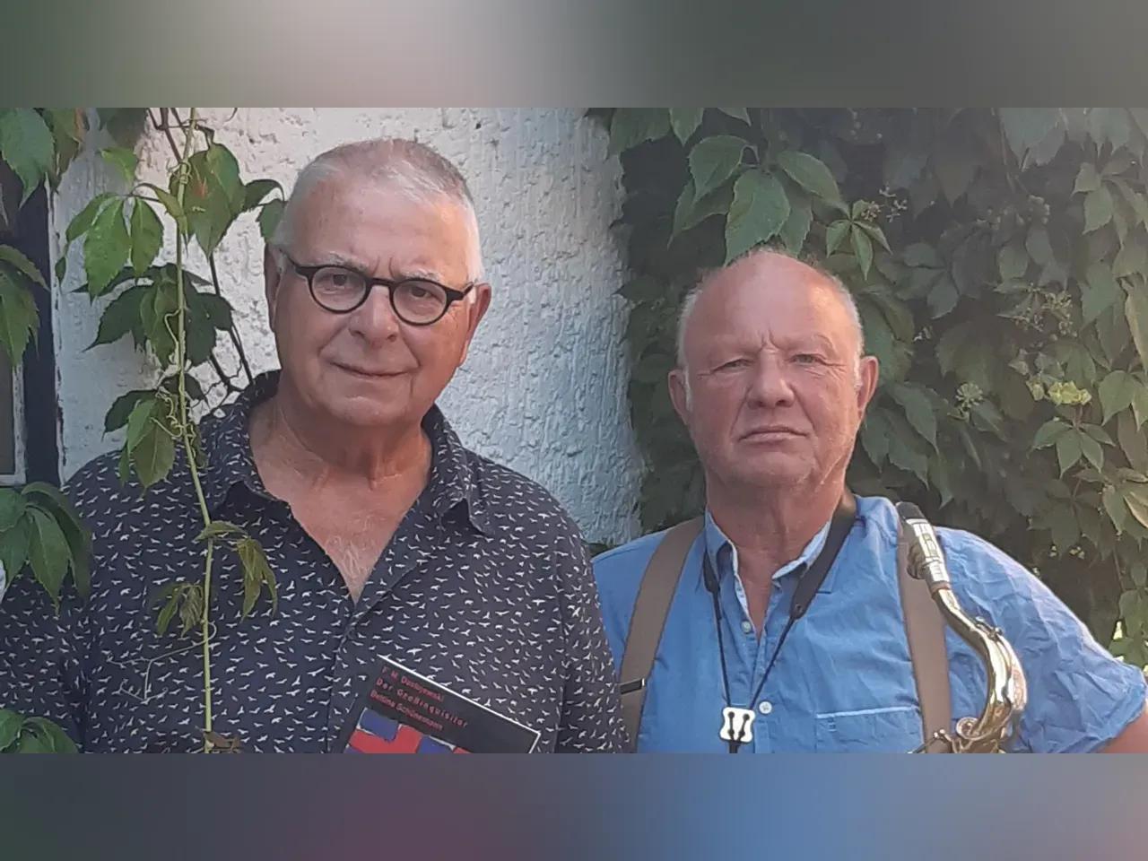 Foto von zwei Männer, links Peter Rauch, ein Mann mit brille und kurzen weißen Haaren, rechts Hans Raths, Mann mit kurzen weißen Haaren 