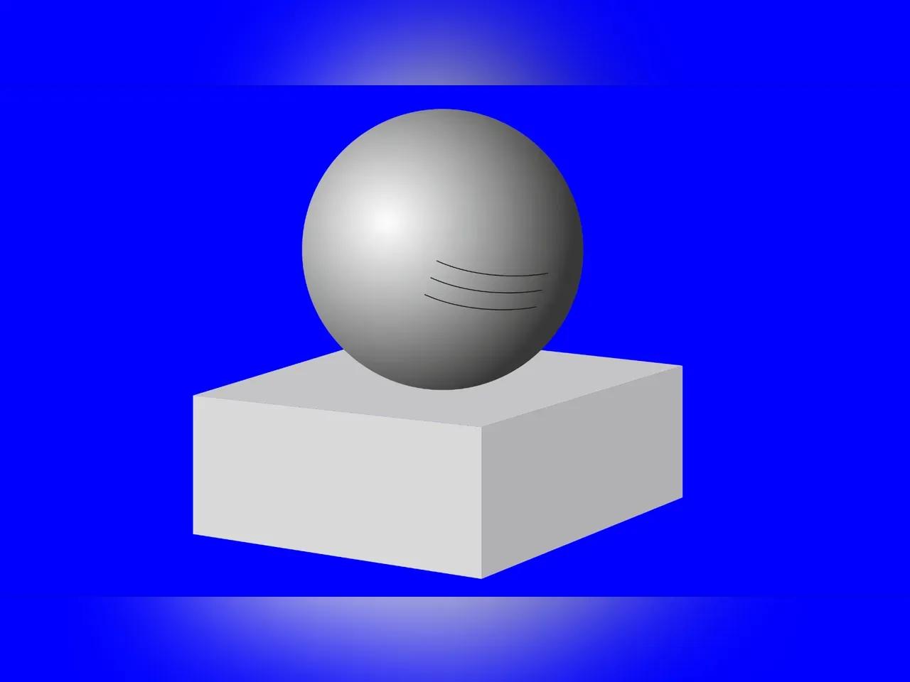 Eine graue Kugel auf einem grauen Quader vor blauem Hintergrund